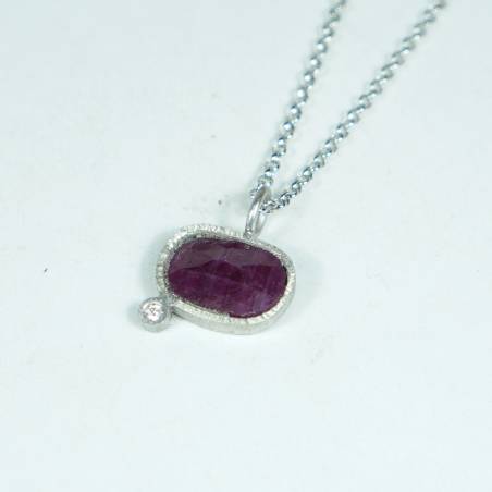 Tiny silver pendant