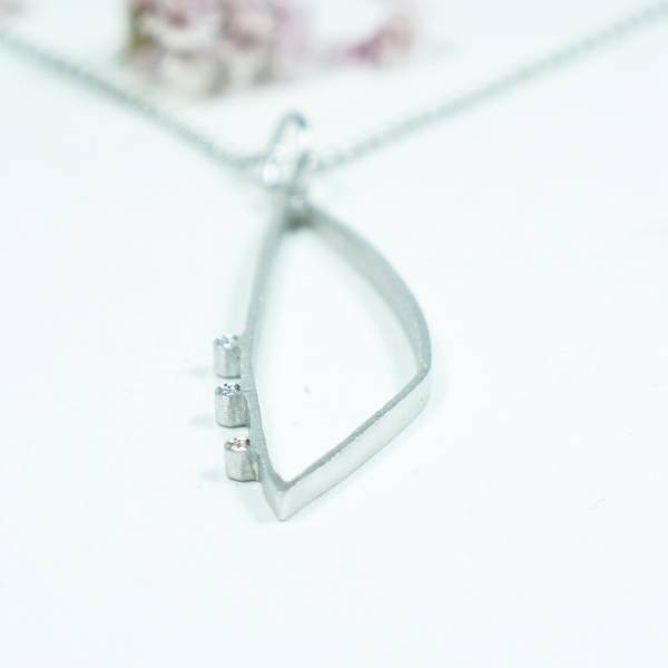 Large silver pendant with diamonds