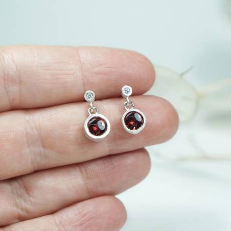 Large silver earrings with movement