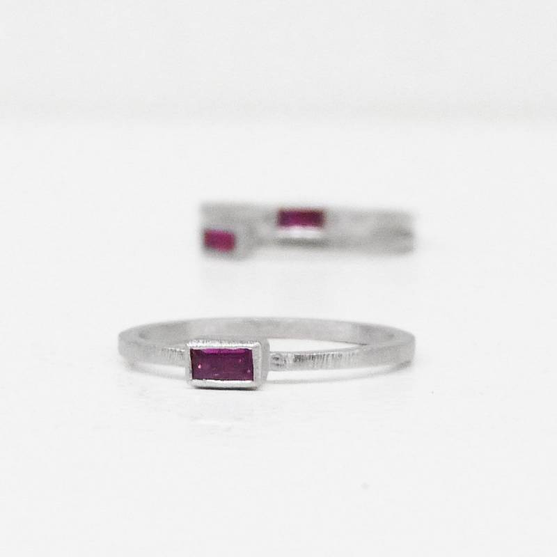 Minimalist design ring with a ruby baguette