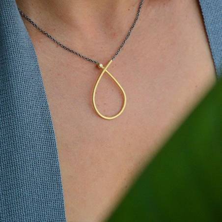 18 kts gold and natural diamond pendant, Infinity.