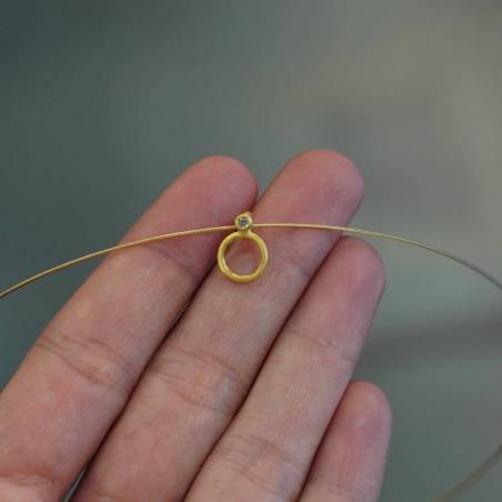 Gold woman pendant.