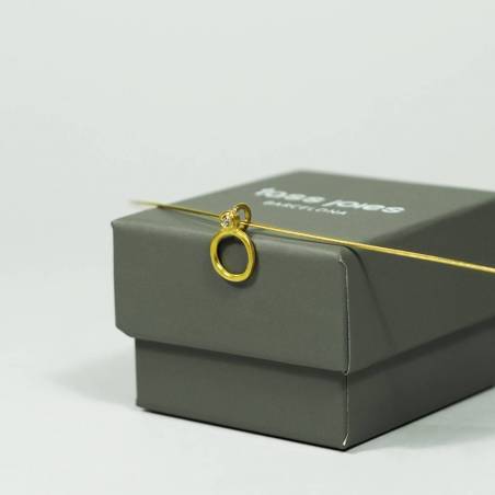 Colgante de oro y diamante.