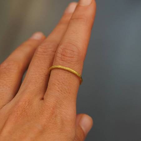 Original wedding ring, handmade in 18 kts yellow gold.