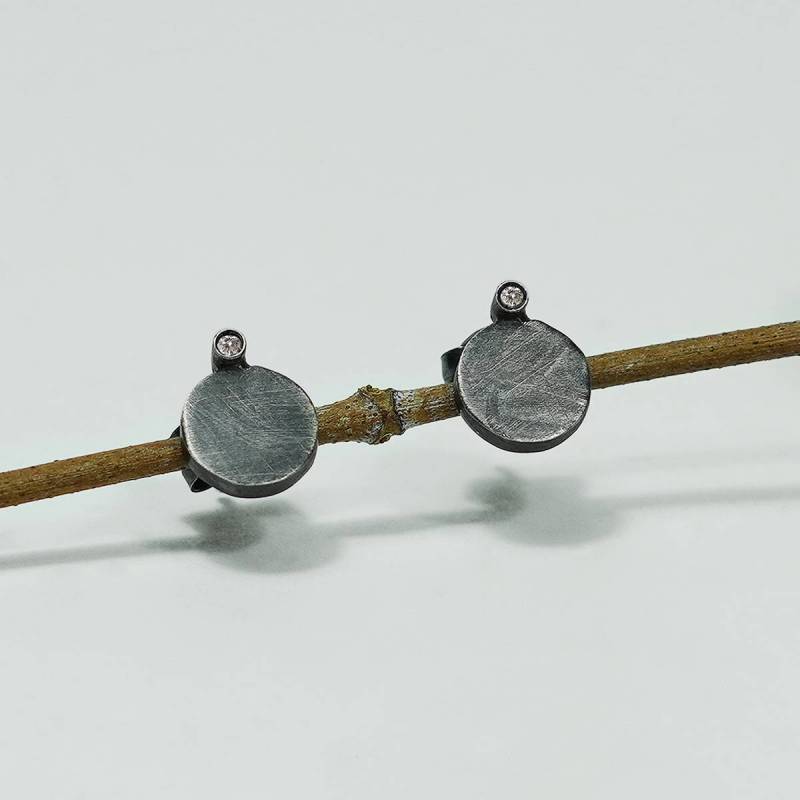 Pendientes de plata y diamante, ORÍGENS