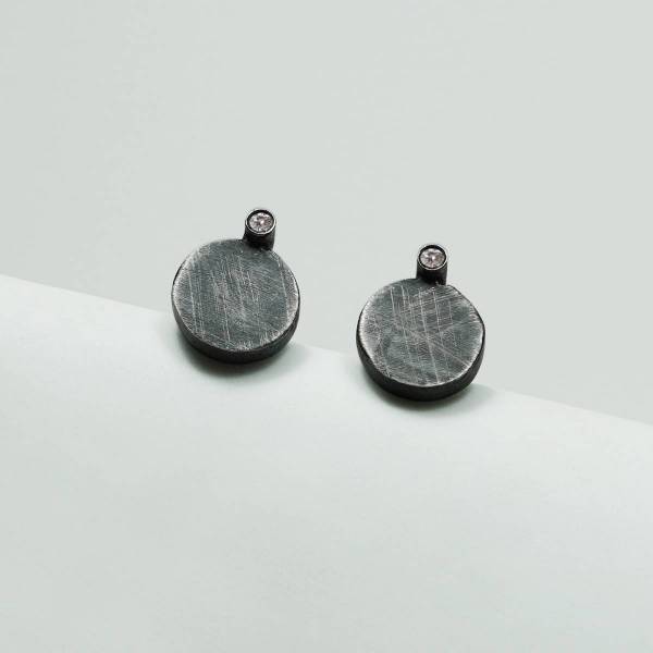 Arracades de plata i diamant, ORÍGENS