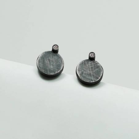 Pendientes de plata y diamante, ORÍGENS