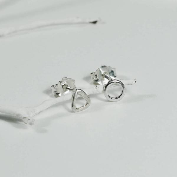 These minimalist design earrings are made or sterling silver