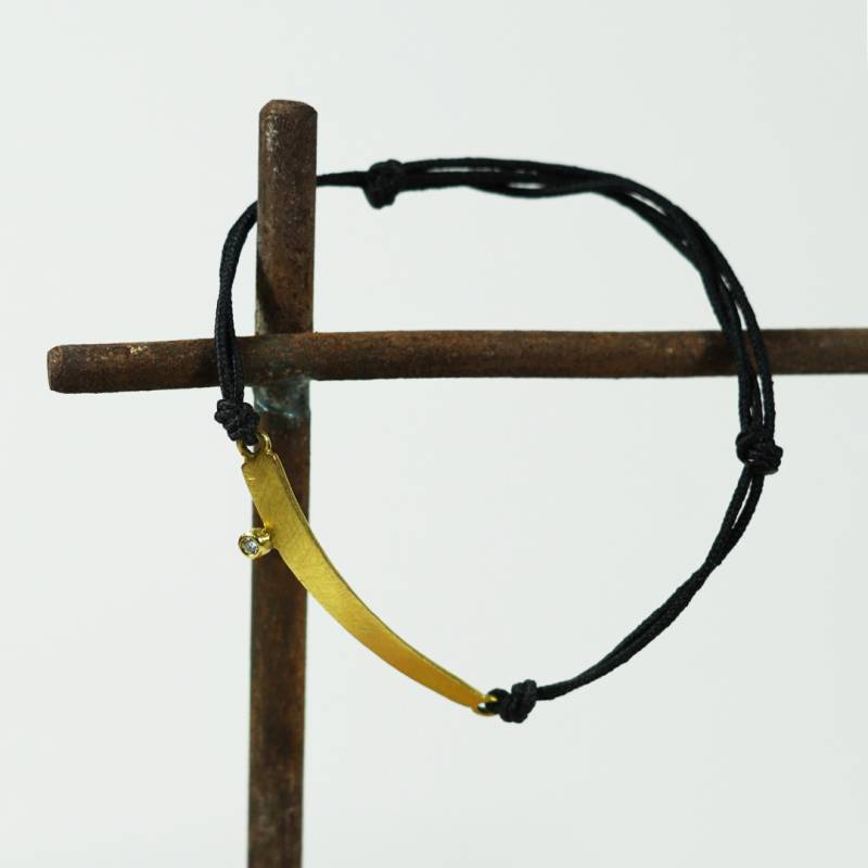 Handmade bracelet with 18 kts gold