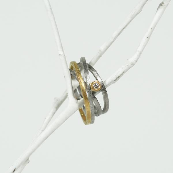 Anell plata i or amb diamant natural