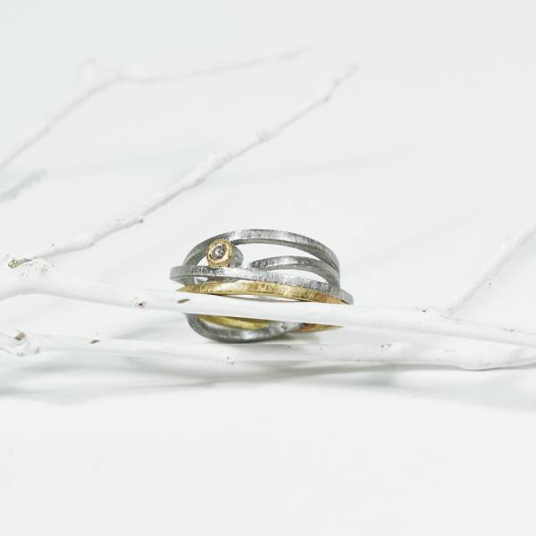 Design rhodium silver ring with gold and diamond