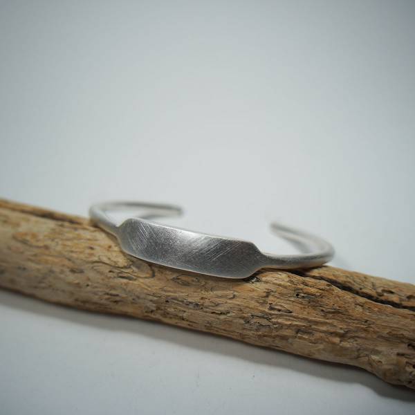 Wide silver bracelet