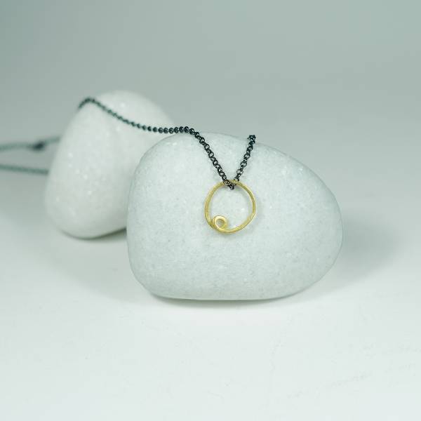 Minimalist gold pendant