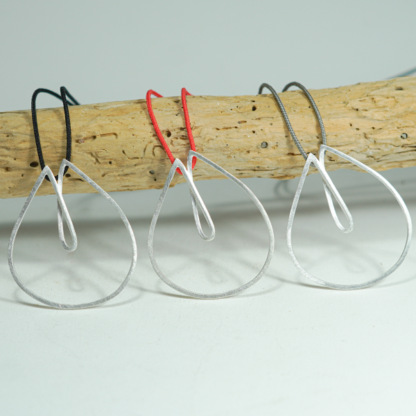 Sterling silver necklace with colour cord