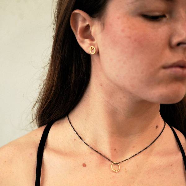 tiny gold pendant