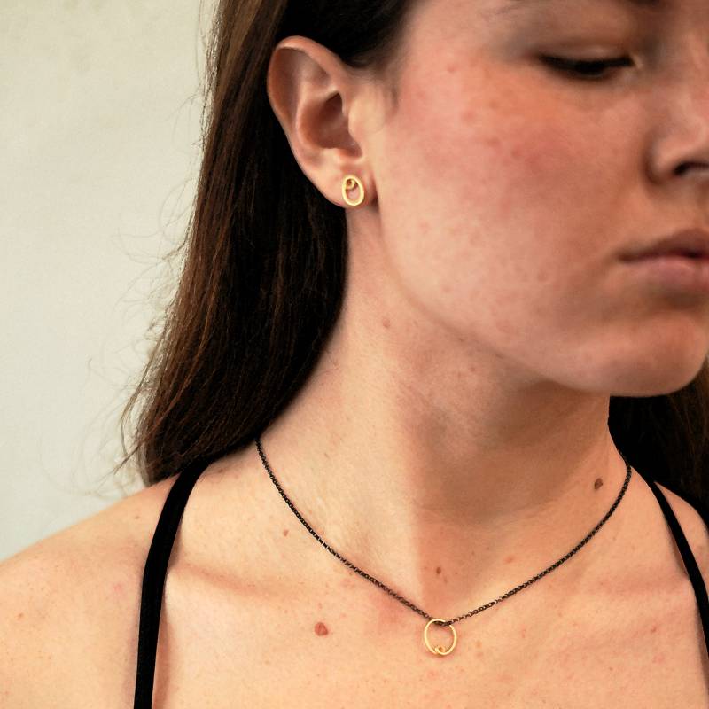 tiny gold pendant