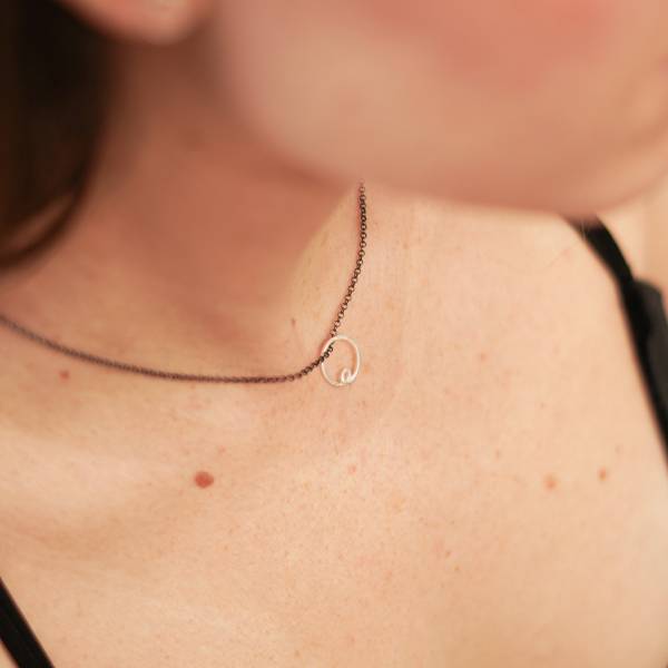 Tiny silver pendant