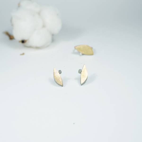 Gold and silver earrings with genuine diamond