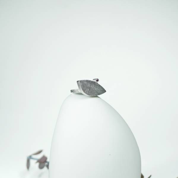Small silver ring with gemstone