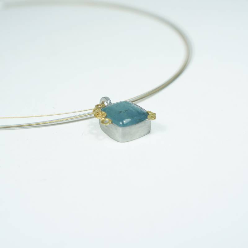Silver and 18 kts gold and aquamarine