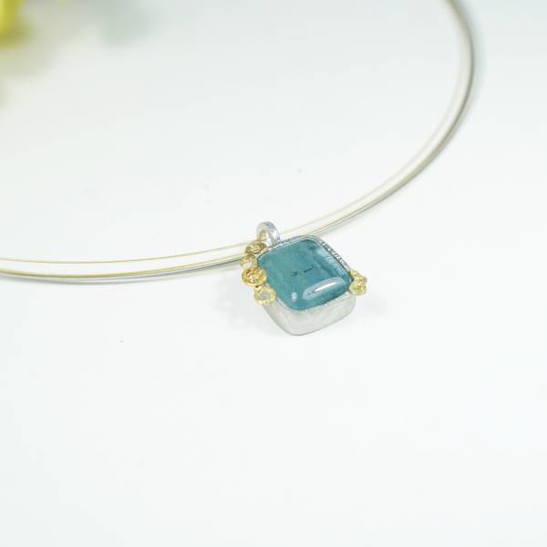 Colgante de plata y oro con aguamarina