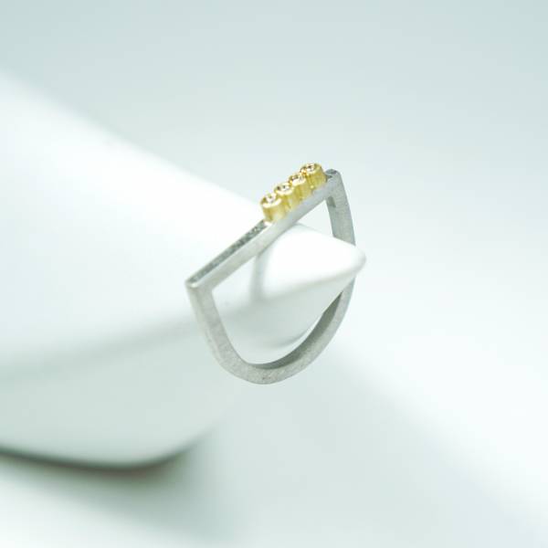Gold and silver ring with diamonds