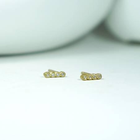 Tiny gold earrings