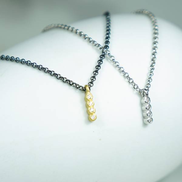 GOLD AND SILVER NECKLACE