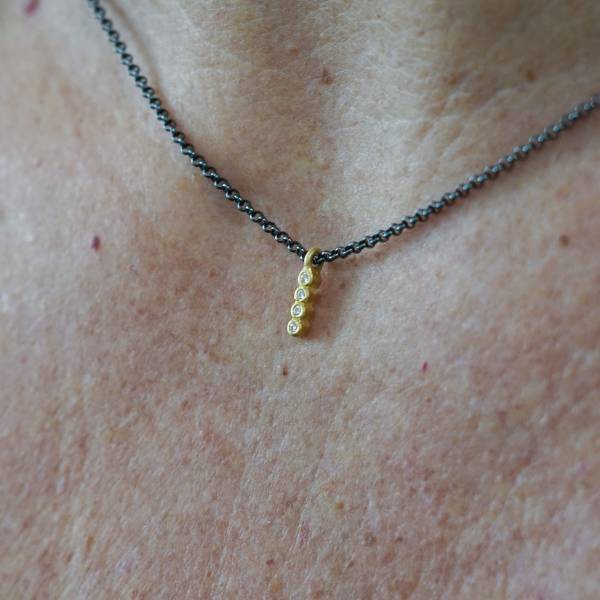 Penjoll or llei i diamants naturals