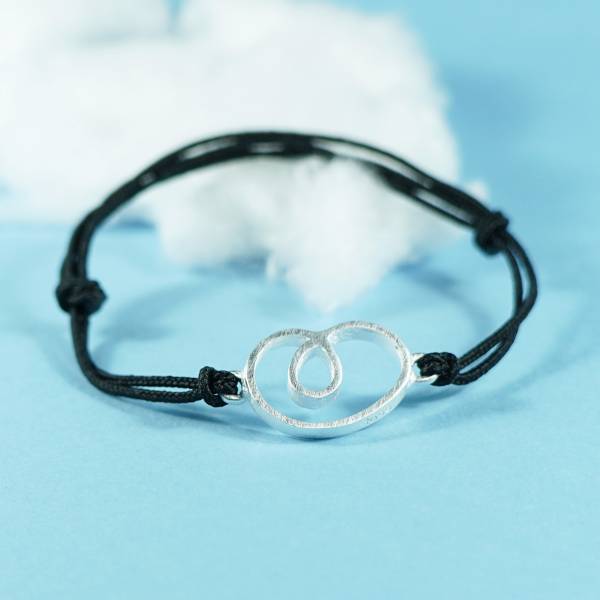 Pulsera de plata con cordón