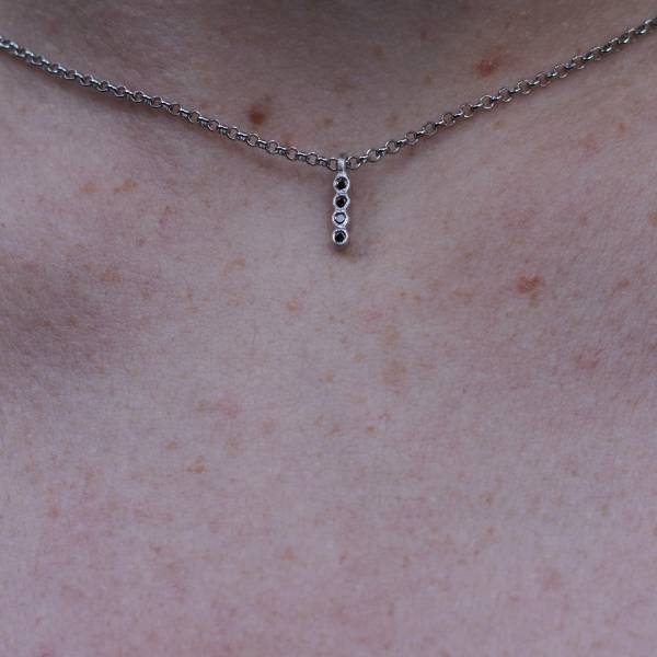Rhodium silver pendant with black diamonds